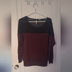 Sweater sheer top cotton bottom.      fits nicely new burgundy in colour size lg